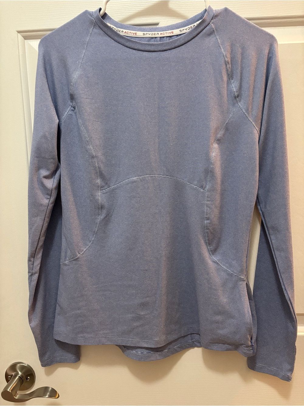 Spyder woman’s Long-Sleeve Performance Top - Light Blue